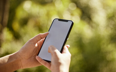 Wall Mural - Hands, outdoor and woman with smartphone, typing and texting with internet, nature and social media. Closeup, person and girl with cellphone, mockup space and contact with connection and digital app