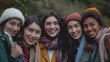 © P - A group of young women from various ethnicities, all smiling and standing closely together