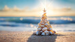 © Daniel - Small seashell christmas tree on the beach with copy space