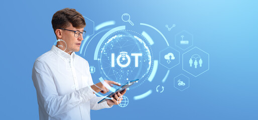 Poster - Man interacting with IoT interface on tablet, futuristic digital