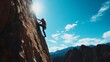 © Morning - A rock climber scales a steep rock face.