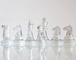 © VASSELL TRADING - glass chess pieces on white background - reflection, strategy, game, transparent, white, still life