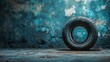 © Pixel Chaser  - Abandoned Tire on a Dirty Concrete Floor