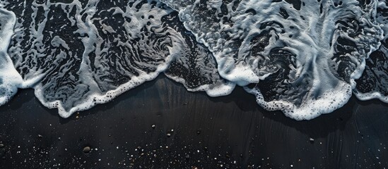 Wall Mural - Abstract Sea With Black Sand