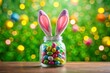 © Wanlop - Colorful Easter candy jar with bunny ears on a vibrant green background for festive celebrations