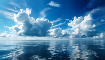 Serene seascape under a vibrant sky adorned with fluffy blue clouds