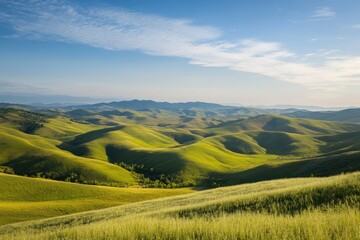 Scenic view of rolling green hills and mountains