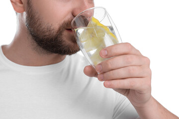 Sticker - Man drinking water with lemon on white background, closeup