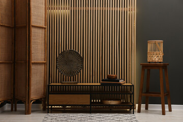 Aufkleber - Stool, wooden cabinet and decor elements in room. Stylish interior design