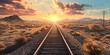 © HappyPic - A train track in the desert with a sunset in the background