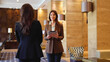 © PeopleVideos - Beautiful entrepreneur meeting with her business partner to discuss business