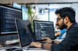 © jiratip - Full Stack Developer Front End businessman  typing on his laptop at a desk