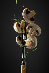 Poster - White fresh champignons with rosemary.