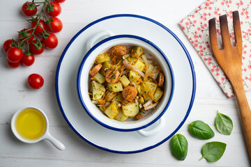 Wall Mural - Healthy potato, onion and sausage salad. Top view table with decorations.