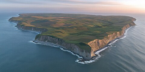 Wall Mural - Aerial View of Rugged Coastal Island with Cliffs and Ocean at Sunset: Pristine Landscape and Beautiful Natural Scenery