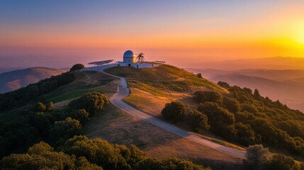 Wall Mural - a beautiful sunset view of an observatory on a hill, with telescopes lined up, ready for the evening