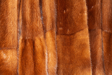 background of winter fur coats, close-up.