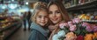 © VizGen - Mother and daughter in a supermarket with flowers