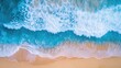 © nikomsolftwaer - Top-down view of a serene blue ocean with sunlit waves and sandy beach, perfect for showcasing tropical paradise