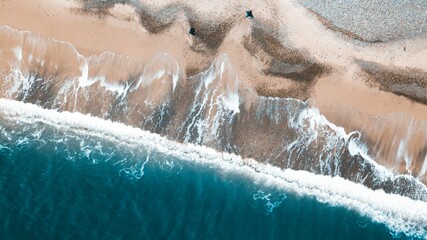 Sandy beach with clear sea view from above perfect summer vacation destination scenic ocean water and shoreline natural landscape beautiful coastline