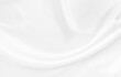 © Kamjana - White gray satin texture that is white silver fabric silk background with beautiful soft blur pattern natural.