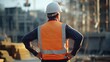© The Little Hut - Construction worker in safety vest and hard hat inspecting structure at building site experiencing low back pain Concept of occupational health and safety : Generative AI