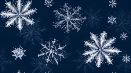 Delicate white snowflakes on a dark blue background with copy space