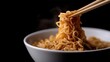 © Business Image - Steaming noodles on chopsticks - minimalistic culinary art