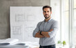 © Ailish_ART - A confident male architect stands in front of blueprints and architectural drawings.