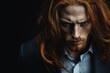 © Avve Diana  - Studio portrait of an intense red-haired man with a long beard