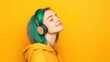 © MUdaylah - Close up side view young fun happy woman with dyed green hair wearing hoody casual clothes listen to music in headphones isolated on plain yellow orange background studio portrait. with generative ai