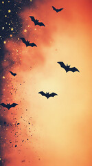 Poster - Bats fly against a dreamy orange and black Halloween sky.