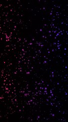 Fototapete - Neon colored dots moving in space. Animation. Abstract animation of moving colored neon dots on a black background