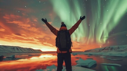 Wall Mural - An individual backpacking Visit the Lofoten Islands in Norway to witness the Northern Lights The frozen ocean and mountains of the Northern Lights at night. Travel to Norway.