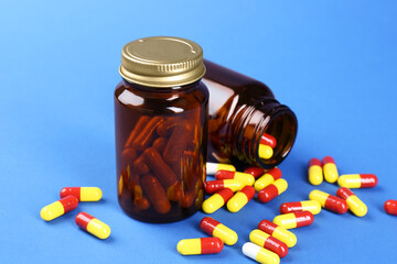 Poster - Pharmacist. Pills in plastic bottles on blue background