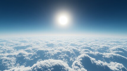 a tranquil view above the clouds, with a deep blue sky and a small bright sun just above the horizon
