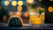 © Jhati - Celebrate National Bartender Day with a refreshing cocktail next to a vibrant cactus