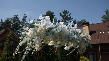 Poster - an arch for a wedding ceremony in a flower garden