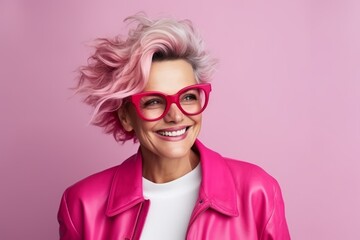 Wall Mural - Portrait of a beautiful woman with pink hair wearing pink leather jacket and glasses