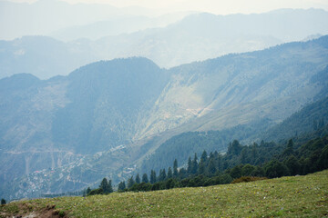 Scenic landscape of Tirthan Valley,Shangarh with view of the Himalayan range, Himachal Pradesh, India.