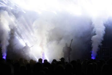 Canvas Print - Crowd at concert and blurred stage lights.