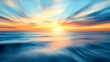 © pentolo - Vibrant sunset over the ocean with blurred motion effect, creating a dreamy and abstract landscape.