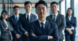 © Surachetsh - Team of business professionals who have inherited their enterprise, full of enthusiasm and determination to drive it forward in the modern era.