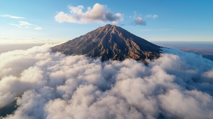 Sticker - Majestic volcanic mountain peak rising above the clouds