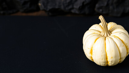 Poster - White Pumpkin on Black Background