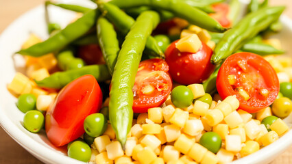 Wall Mural - Fresh salad with cherry tomatoes, corn, and green beans