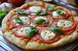 © kavinda - A classic Margherita pizza with fresh mozzarella, tomatoes, and basil