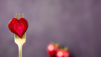 Wall Mural - Heart-Shaped Beetroot on Golden Fork