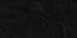© MdLothfor - Empty black wrinkly backdrop paper background. panorama grunge wrinkly paper texture, crumpled pattern texture. paper crumpled texture. black fabric crushed textured crumpled.