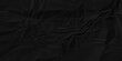© MdLothfor - Empty black wrinkly backdrop paper background. panorama grunge wrinkly paper texture, crumpled pattern texture. paper crumpled texture. black fabric crushed textured crumpled.